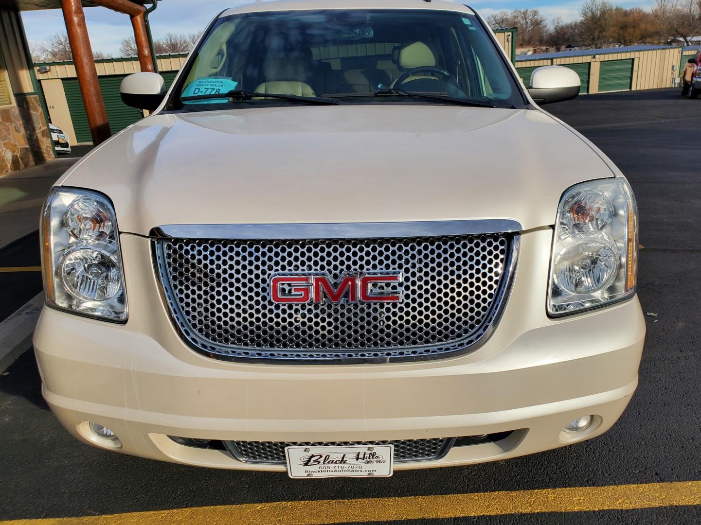 2009 Pearl White /Tan GMC Yukon Denali (1GKFK03219R) with an 6.2L Vortec V8 SFI engine, 6-Speed Automatic, Heavy-Duty, Electronically Controlled transmission, located at 1600 E Hwy 44, Rapid City, SD, 57703, (605) 716-7878, 44.070232, -103.171410 - Photo#1